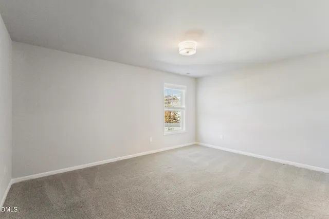 a bathroom with a granite countertop sink and a bathtub