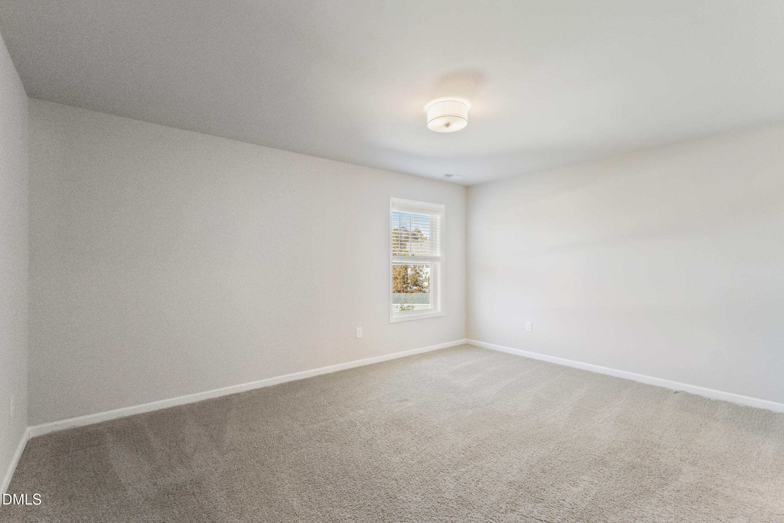 1024 JARRETT BAY Road Willow Spring, NC 27592 - Photo 30 of 43 an empty room with a window