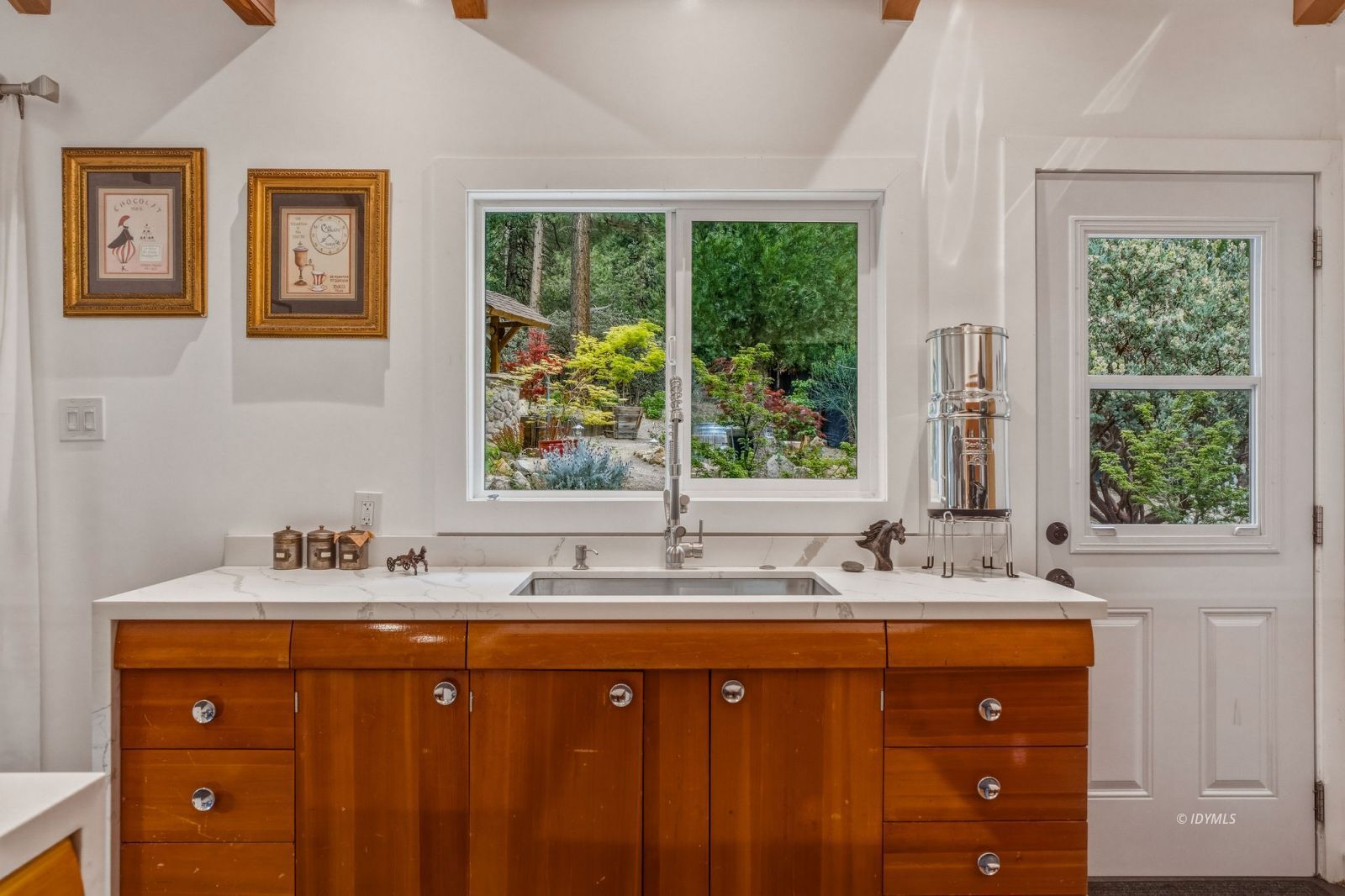 25106 Rim Rock Road Idyllwild, CA 92549 - Photo 20 of 71 Kitchen sink w/backyard views!