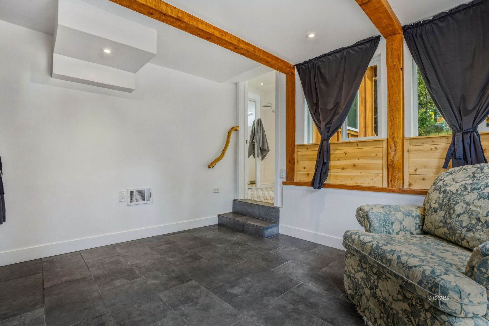 25106 Rim Rock Road Idyllwild, CA 92549 - Photo 54 of 71 a living room with furniture and a window