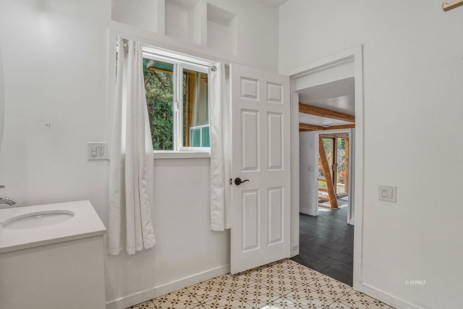 25106 Rim Rock Road Idyllwild, CA 92549 - Photo 59 of 71 a bathroom with a sink and a shower