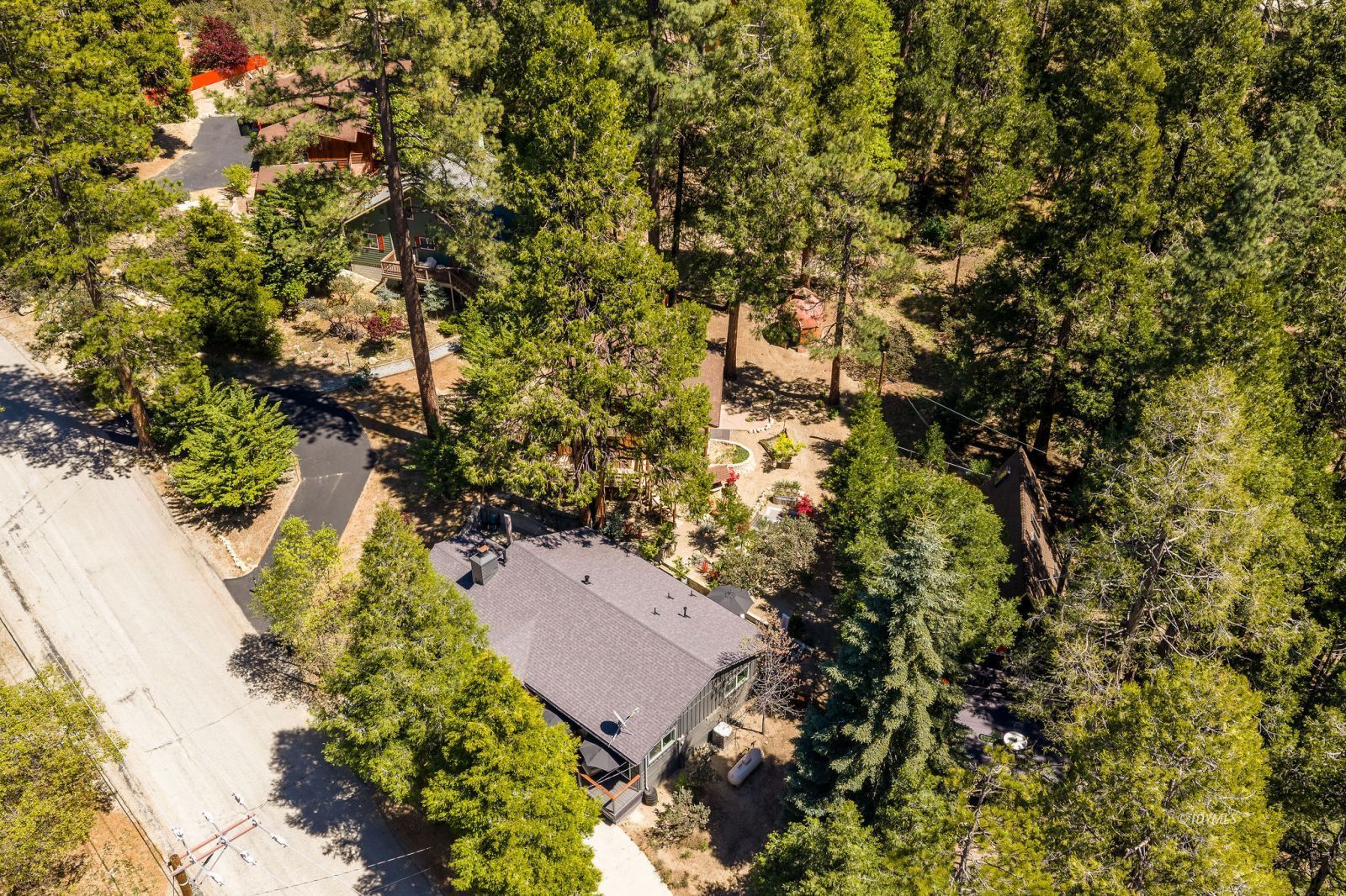 25106 Rim Rock Road Idyllwild, CA 92549 - Photo 69 of 71 an aerial view of a house with a yard