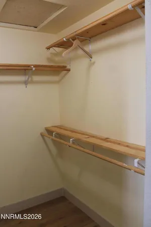 a view of a room with racks on the wall