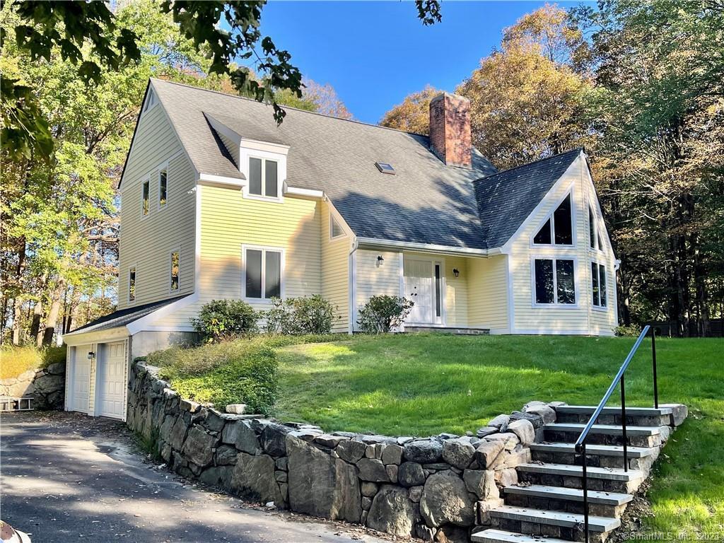 23 Dorethy Road Redding, CT 06896 - Photo 1 of 1 a view of a house with backyard and garden