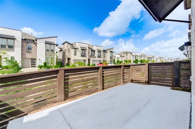 a view of a terrace with sitting area