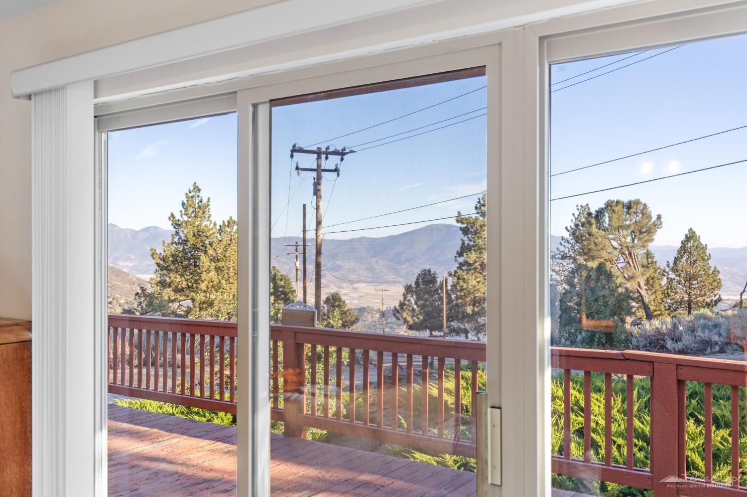 26681 Stirrup Way Tehachapi, CA 93561 - Photo 23 of 55 Primary suite's sliding glass door to the front 2nd floor deck...