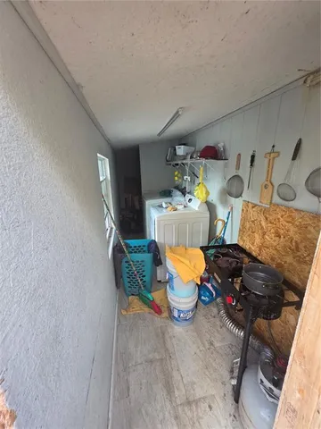 a view of storage and utility room