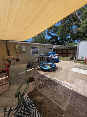 a car parked in front of a house