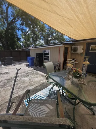 a view of backyard with seating space