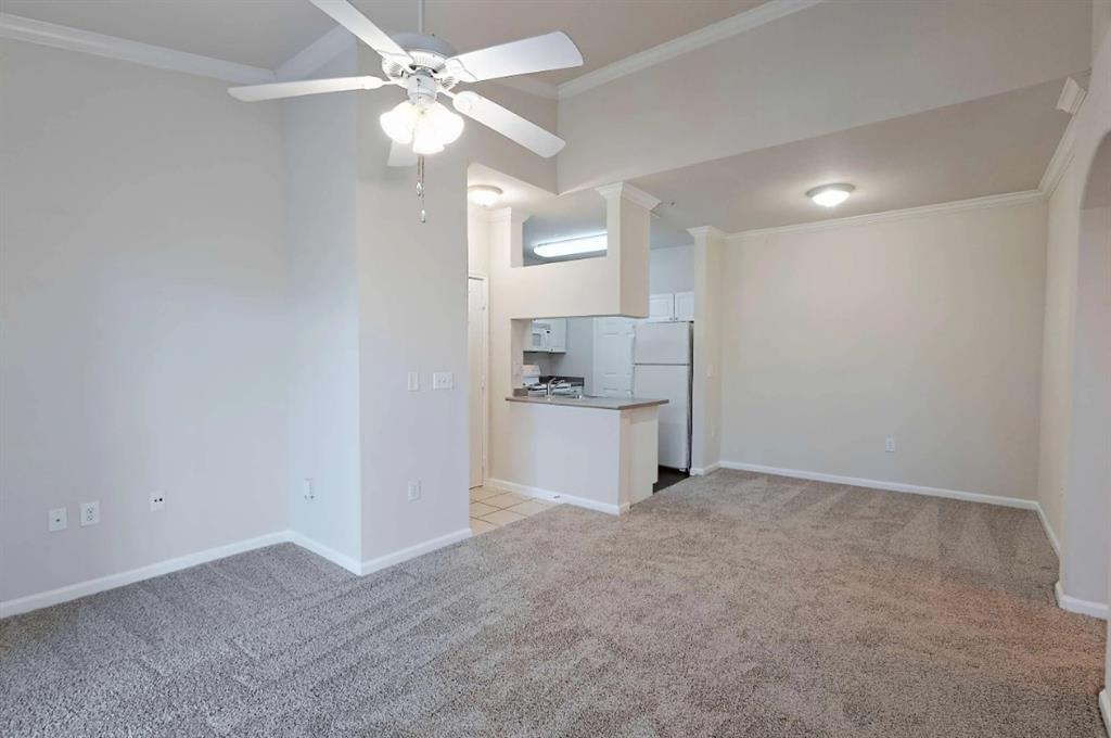 10505 I-35 Frontage Road South, Unit 1718 Austin, TX 78747 - Photo 13 of 21 an empty room with fan and entrance