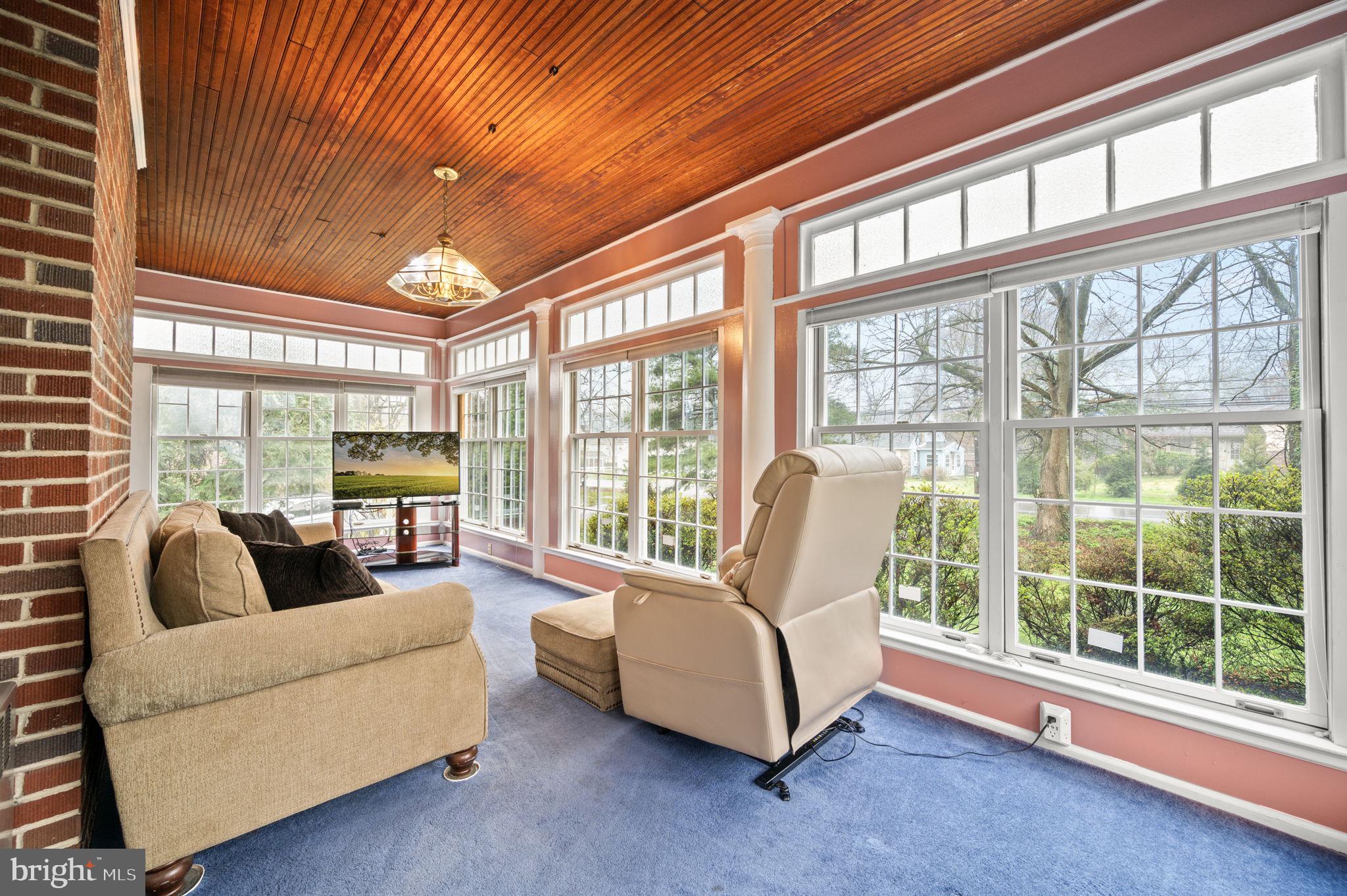 332 South Providence Road Wallingford, PA 19086 - Photo 12 of 69 a living room with furniture and a large window