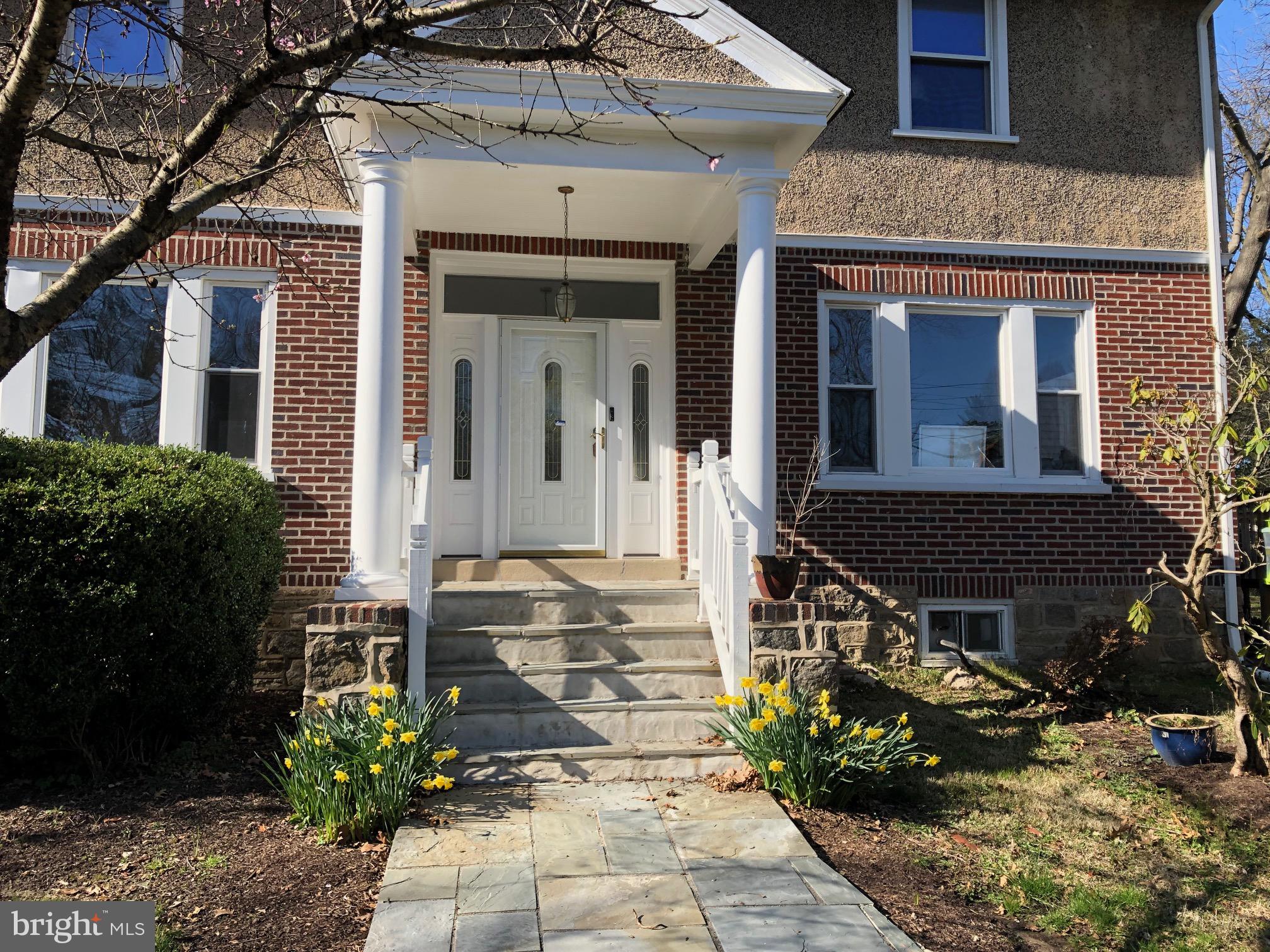 332 South Providence Road Wallingford, PA 19086 - Photo 2 of 69 a front view of a house with garden
