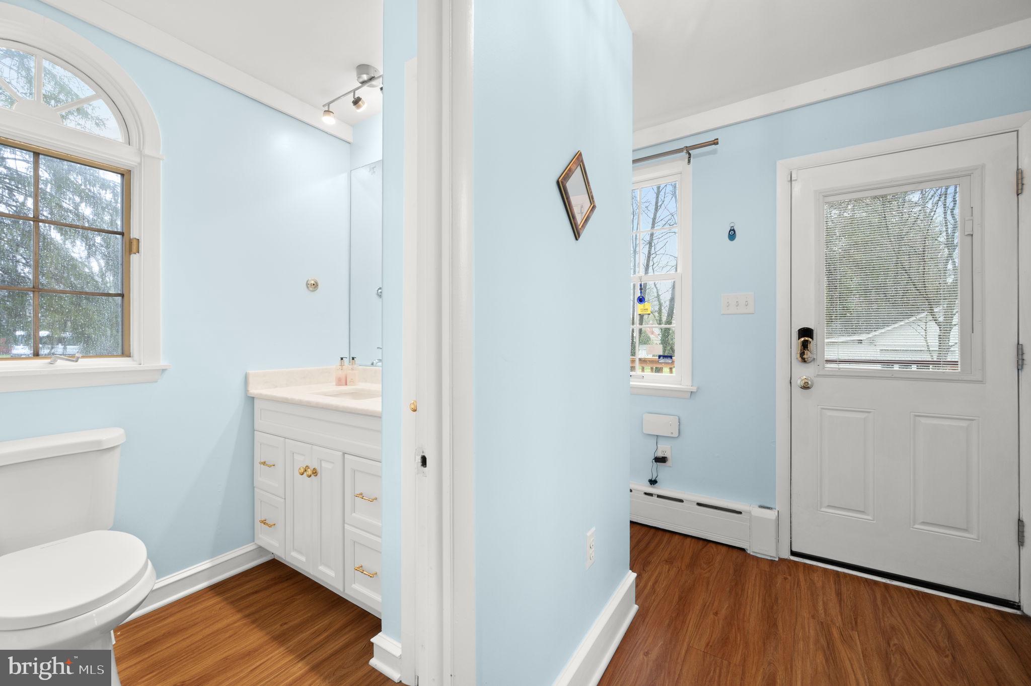 332 South Providence Road Wallingford, PA 19086 - Photo 23 of 69 a bathroom with a sink and a mirror