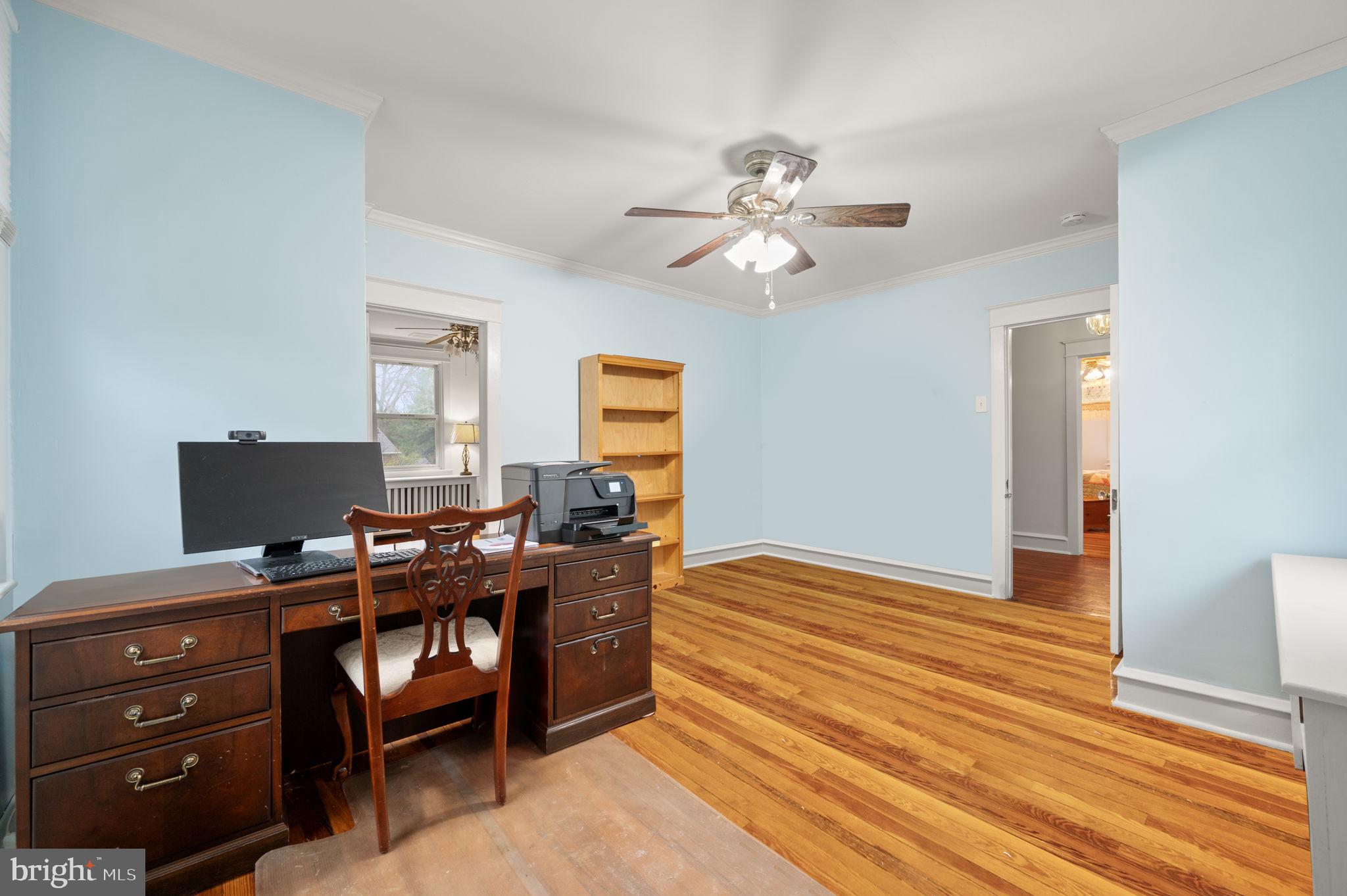 332 South Providence Road Wallingford, PA 19086 - Photo 32 of 69 a view of a workspace with furniture and a window