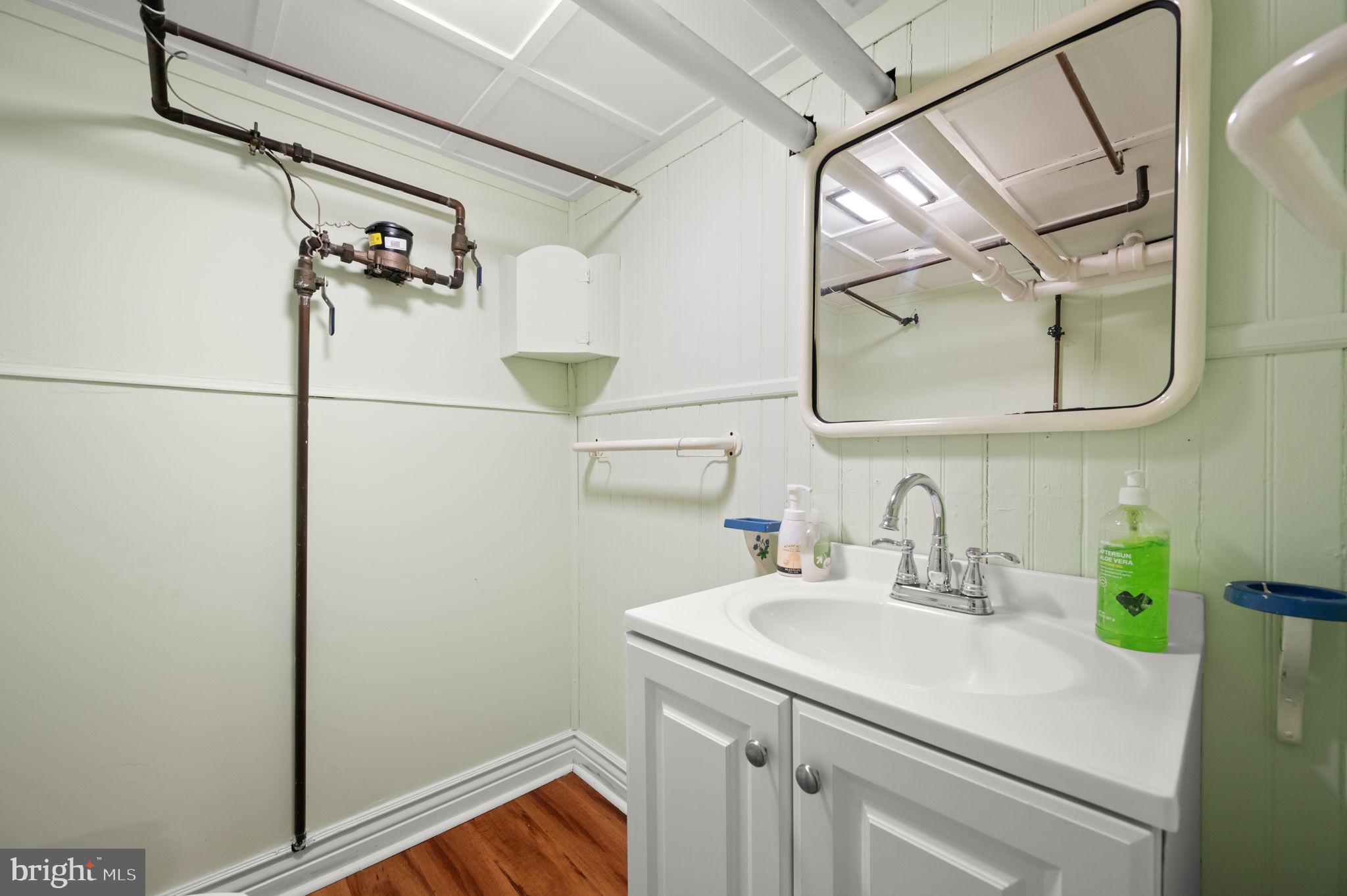 332 South Providence Road Wallingford, PA 19086 - Photo 43 of 69 a bathroom with a sink and mirror