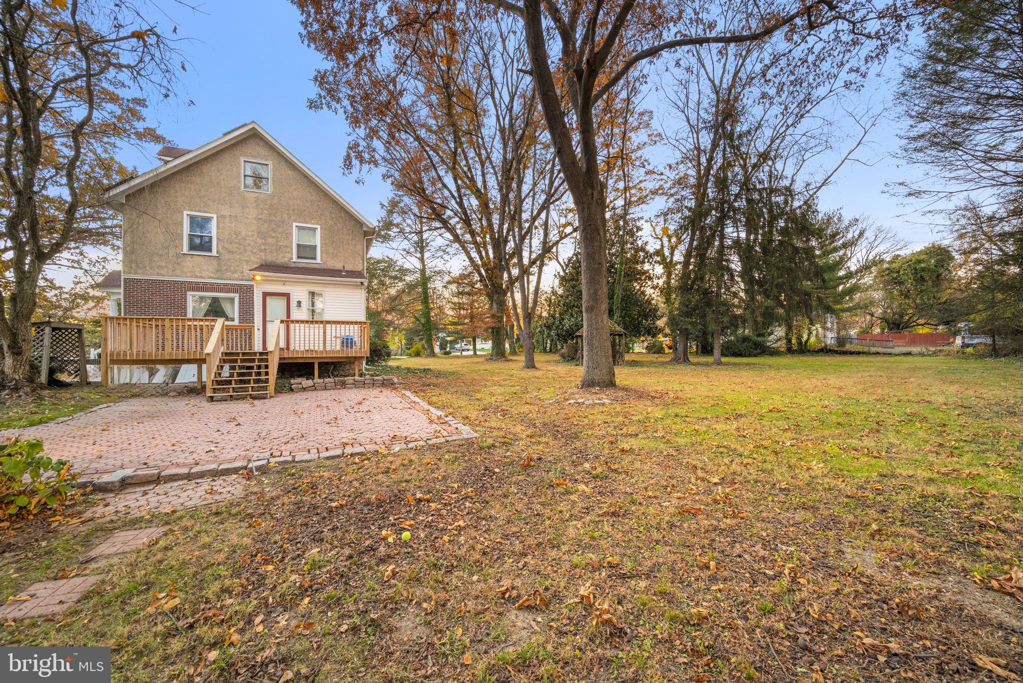332 South Providence Road Wallingford, PA 19086 - Photo 52 of 69 a front view of a house with a yard