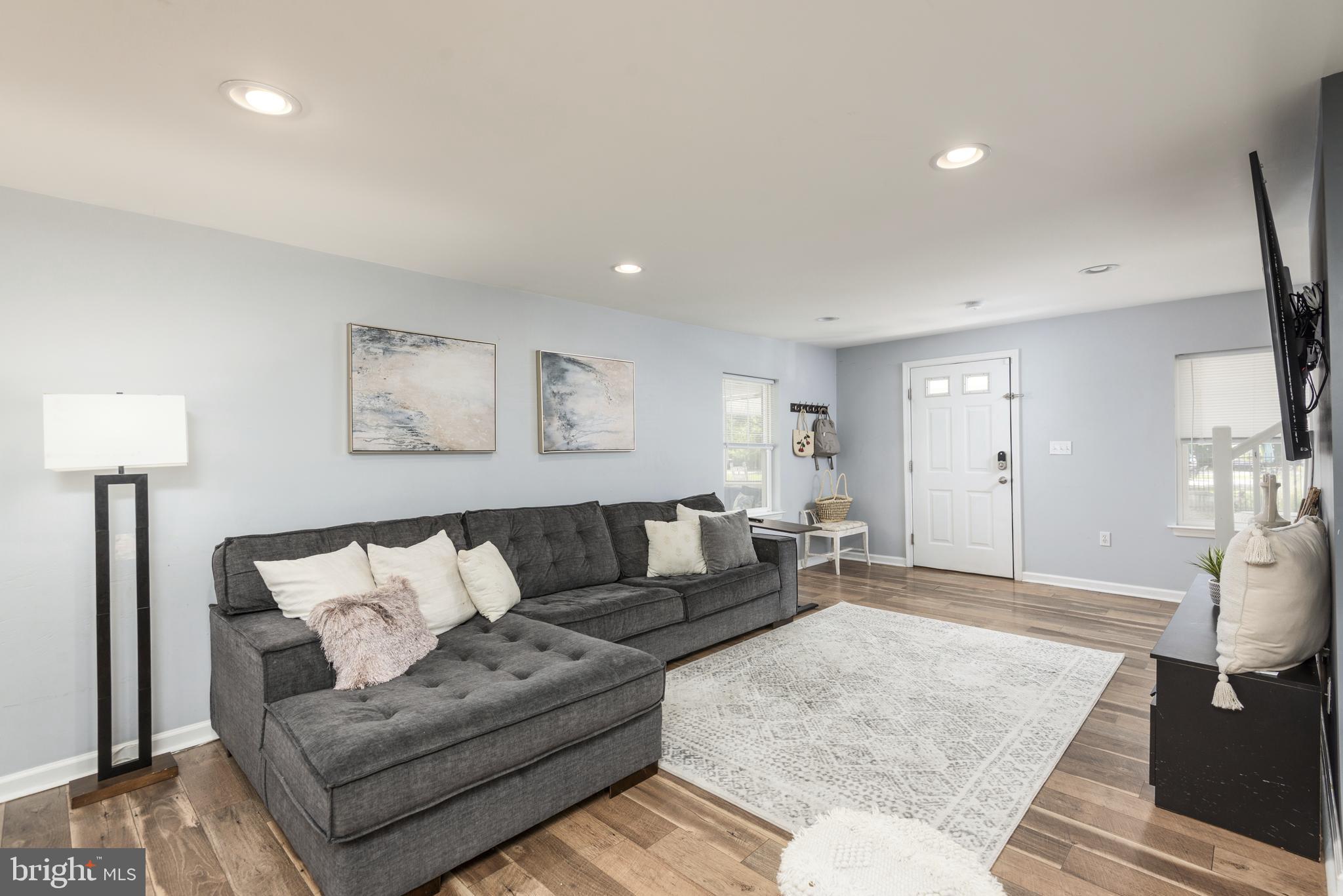 515 Franklin Street Denton, MD 21629 - Photo 4 of 21 a living room with furniture and a couch