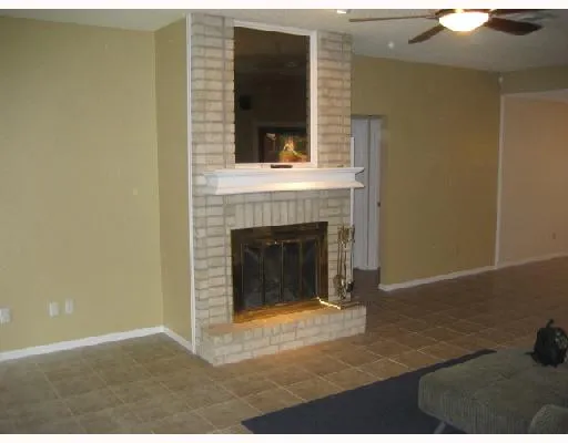 a living room with a fireplace