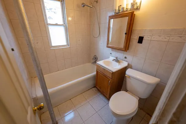 a kitchen with a sink a counter top space and a window