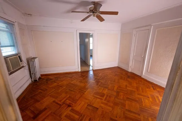 a view of an empty room and window