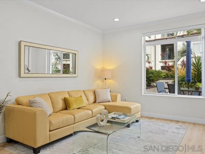 9237 Regents Road, Unit K101 La Jolla, CA 92037 - Photo 5 of 29 a living room with furniture and a window