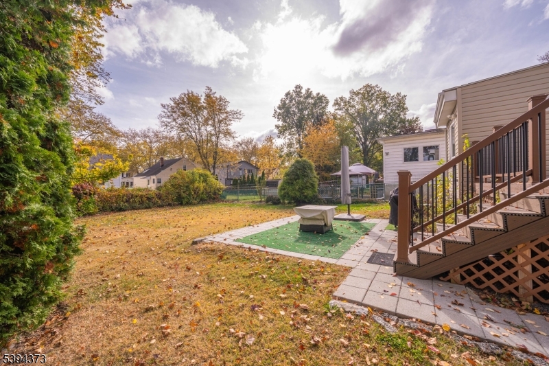 125 Meisel Avenue Springfield, NJ 07081 - Photo 24 of 32 a view of a yard with swimming pool and sitting area