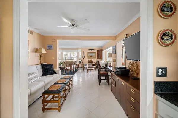 a large white kitchen with lots of counter top space