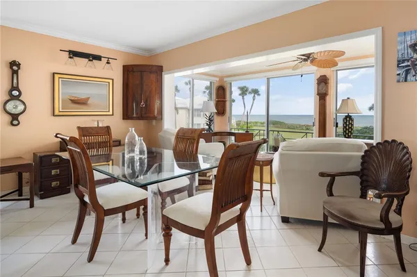 a view of a dining room with furniture