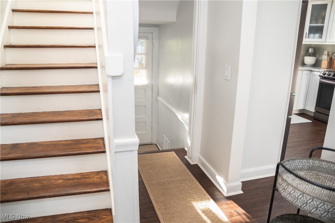 95 Clingan Road Struthers, OH 44471 - Photo 32 of 46 Stairs with wood finished floors and baseboards