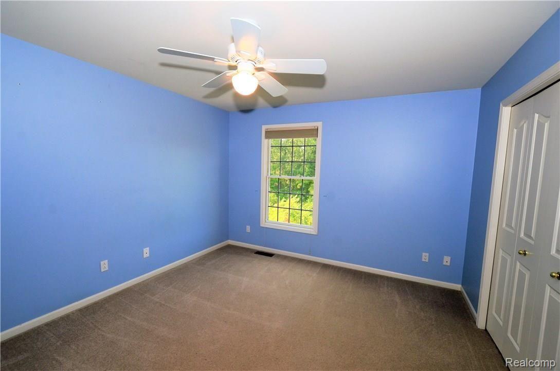 5304 Ashmonte Court Rochester, MI 48306 - Photo 21 of 47 Bedroom with beautiful yard view