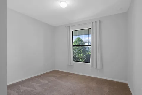 a view of a bathroom from a bathroom