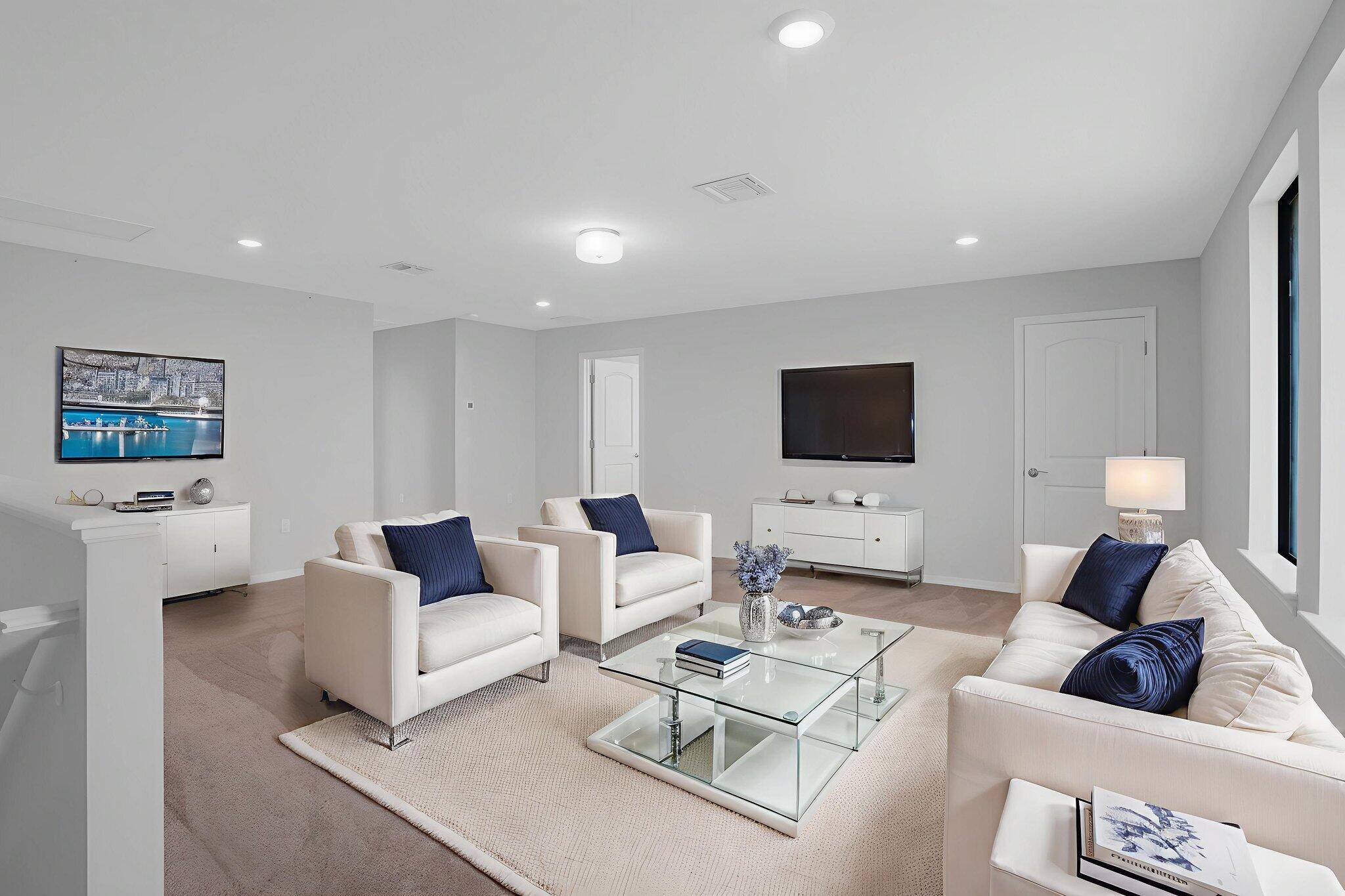 8296 Vaulting Drive Lake Worth, FL 33467 - Photo 33 of 62 a living room with furniture and a flat screen tv