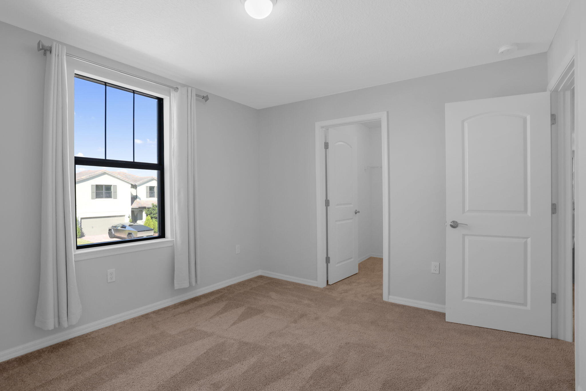 8296 Vaulting Drive Lake Worth, FL 33467 - Photo 42 of 62 a view of an empty room with windows