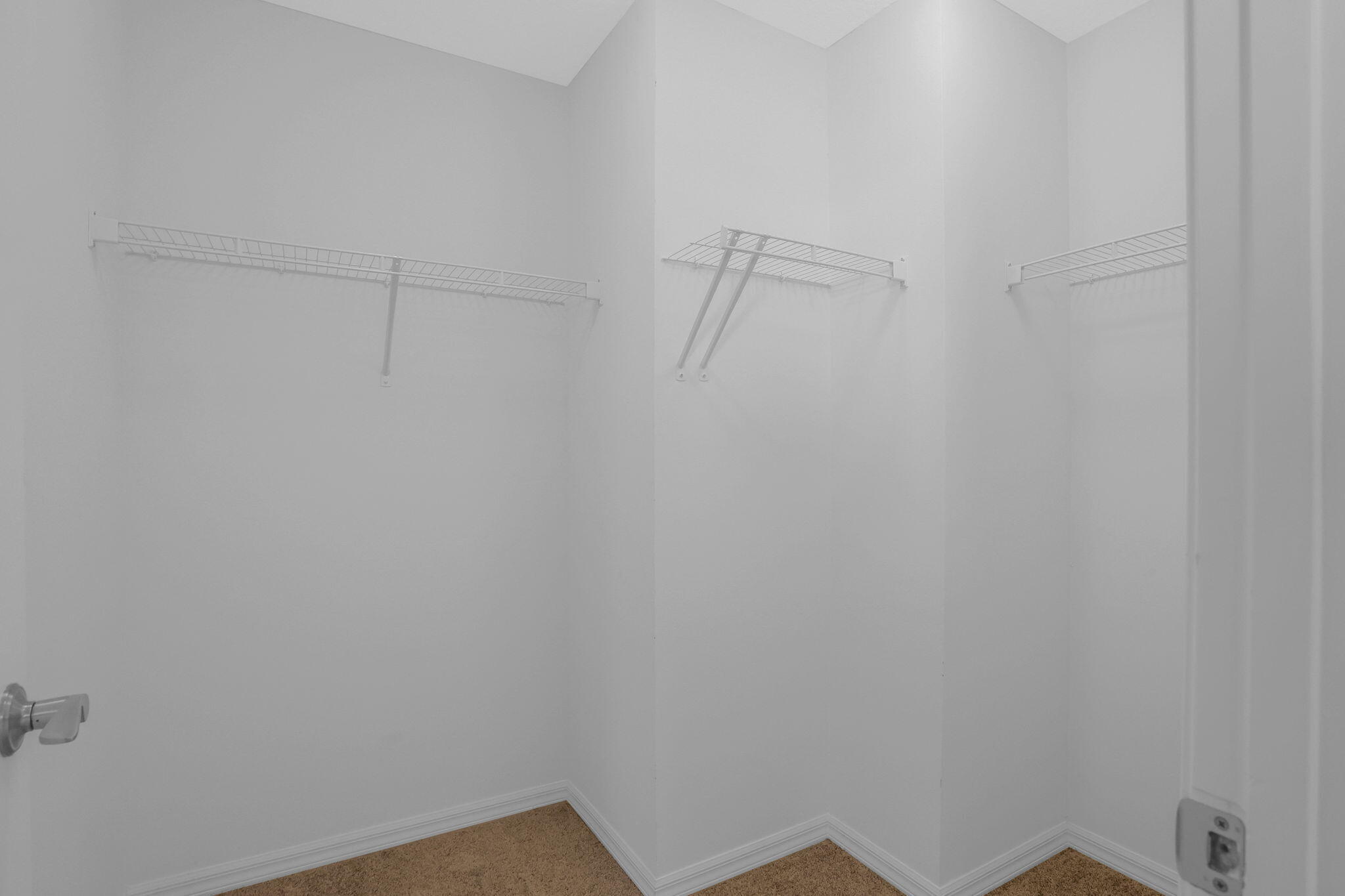 8296 Vaulting Drive Lake Worth, FL 33467 - Photo 43 of 62 a view of small space with racks on the wall