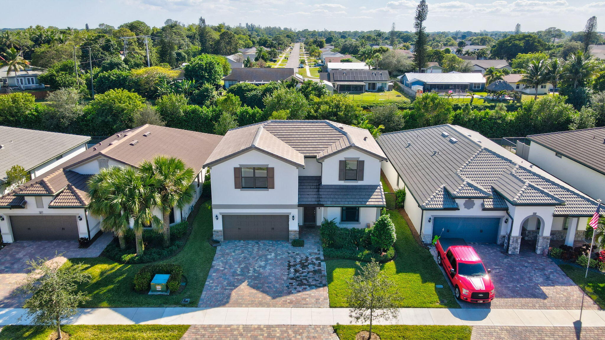 8296 Vaulting Drive Lake Worth, FL 33467 - Photo 50 of 62 an aerial view of a house