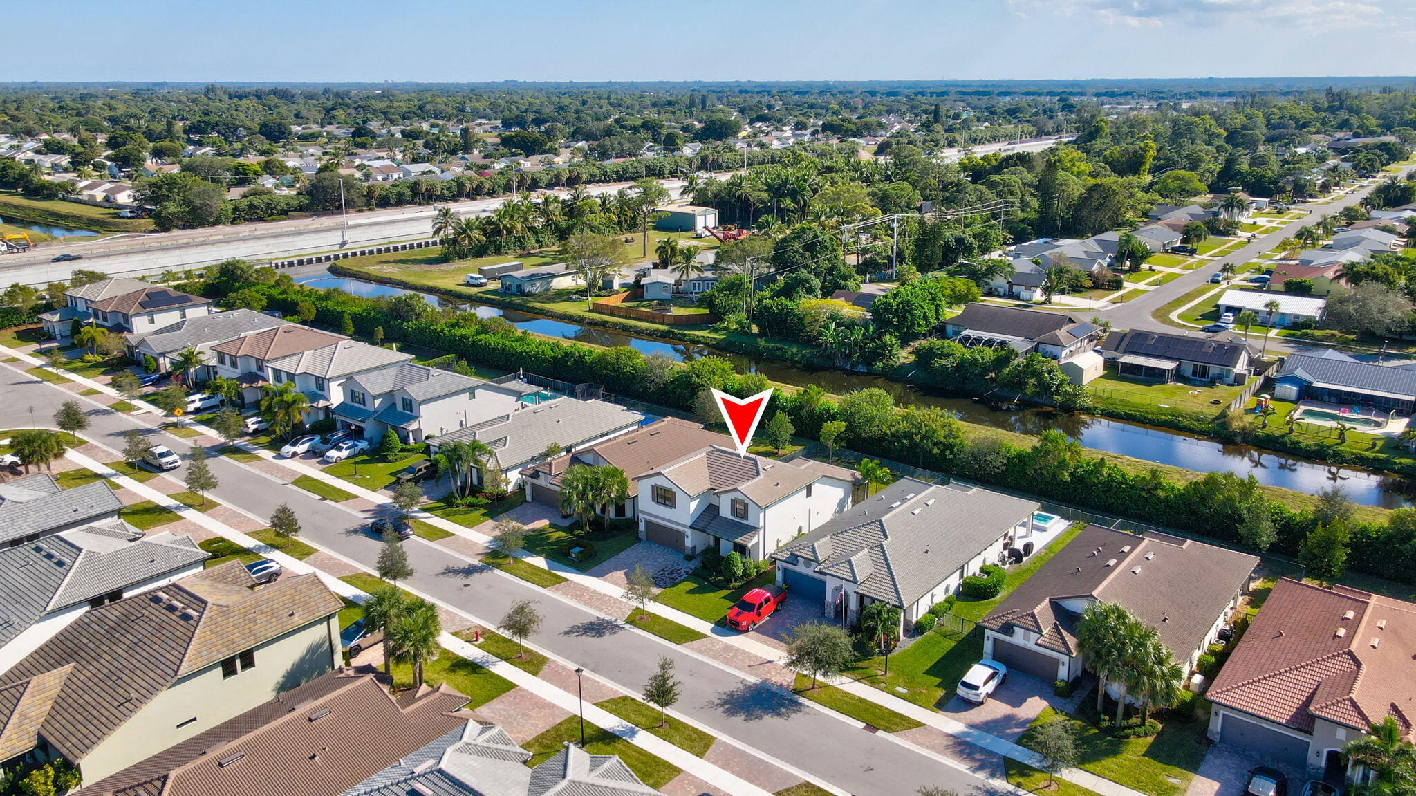 8296 Vaulting Drive Lake Worth, FL 33467 - Photo 55 of 62 an aerial view of a city