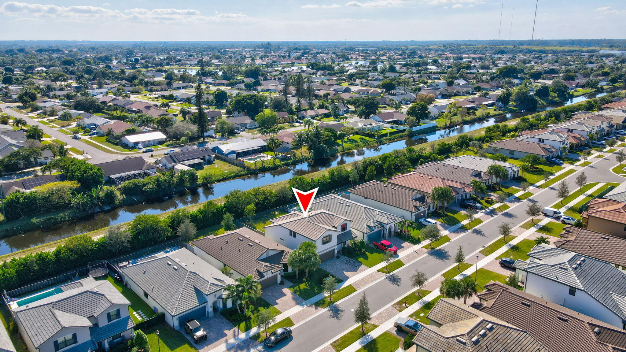 8296 Vaulting Drive Lake Worth, FL 33467 - Photo 56 of 62 an aerial view of a city