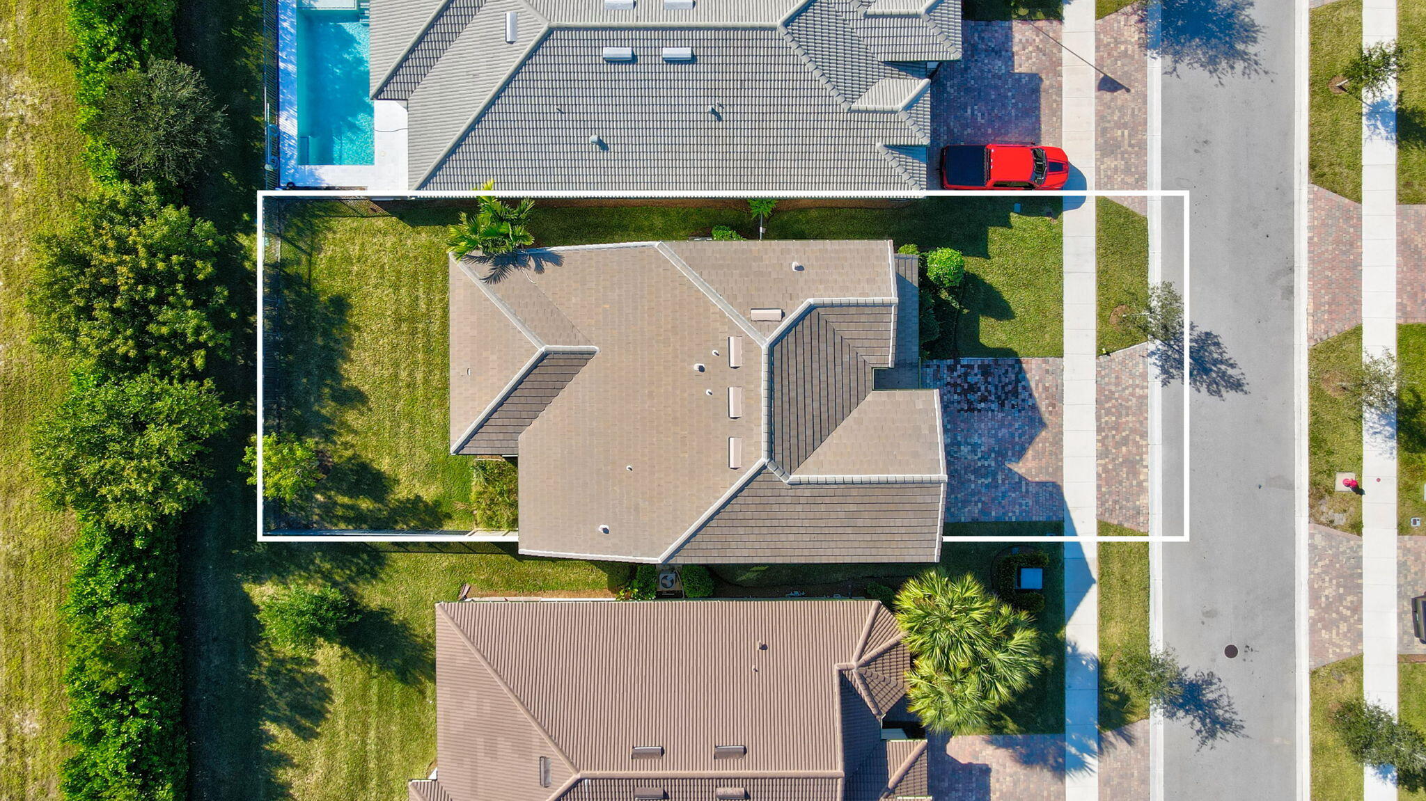8296 Vaulting Drive Lake Worth, FL 33467 - Photo 57 of 62 an aerial view of a house with a yard