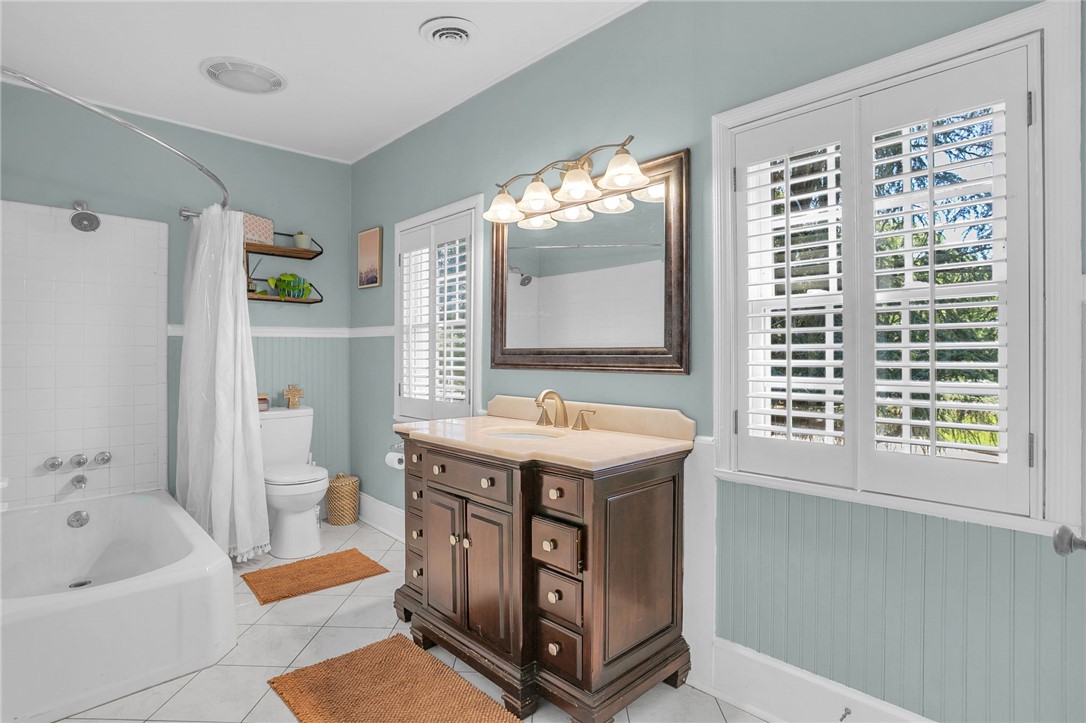 1107 Springdale Road Anderson, SC 29621 - Photo 26 of 49 This bright bathroom features ample natural light and elegant finishes for a refreshed feel.