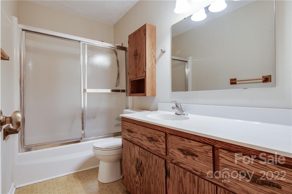 5338 Mt Gallant Road Rock Hill, SC 29732 - Photo 14 of 31 a bathroom with a sink a toilet and shower