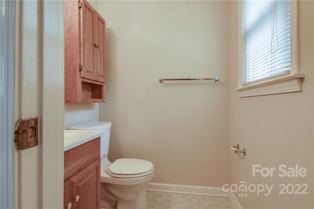 5338 Mt Gallant Road Rock Hill, SC 29732 - Photo 21 of 31 a white toilet sitting next to a bathroom sink