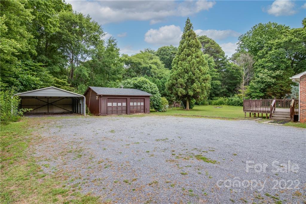 5338 Mt Gallant Road Rock Hill, SC 29732 - Photo 25 of 31 a view of a house with backyard and a tree
