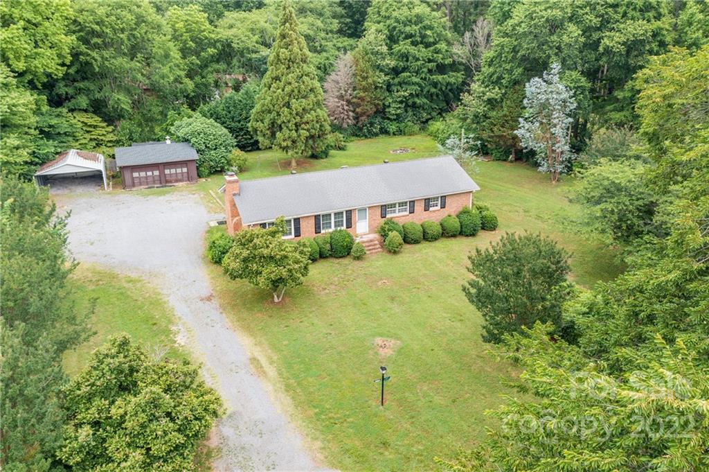 5338 Mt Gallant Road Rock Hill, SC 29732 - Photo 28 of 31 an aerial view of a house with swimming pool and garden