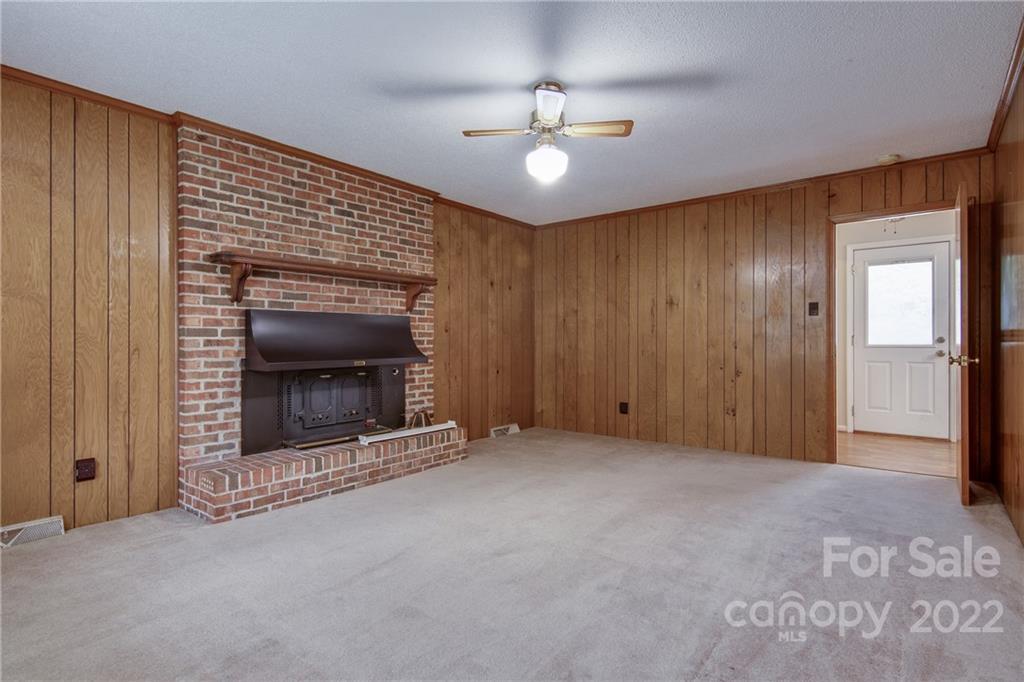 5338 Mt Gallant Road Rock Hill, SC 29732 - Photo 7 of 31 a view of an empty room with a fireplace