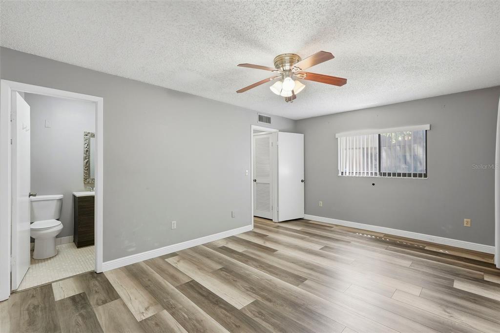 11709 Raintree Village Boulevard, Unit C Temple Terrace, FL 33617 - Photo 11 of 23 a view of an empty room with a bathroom