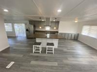 1220 Tasman Drive, Unit 87D Sunnyvale, CA 94089 - Photo 16 of 16 a kitchen with a table and chairs in it