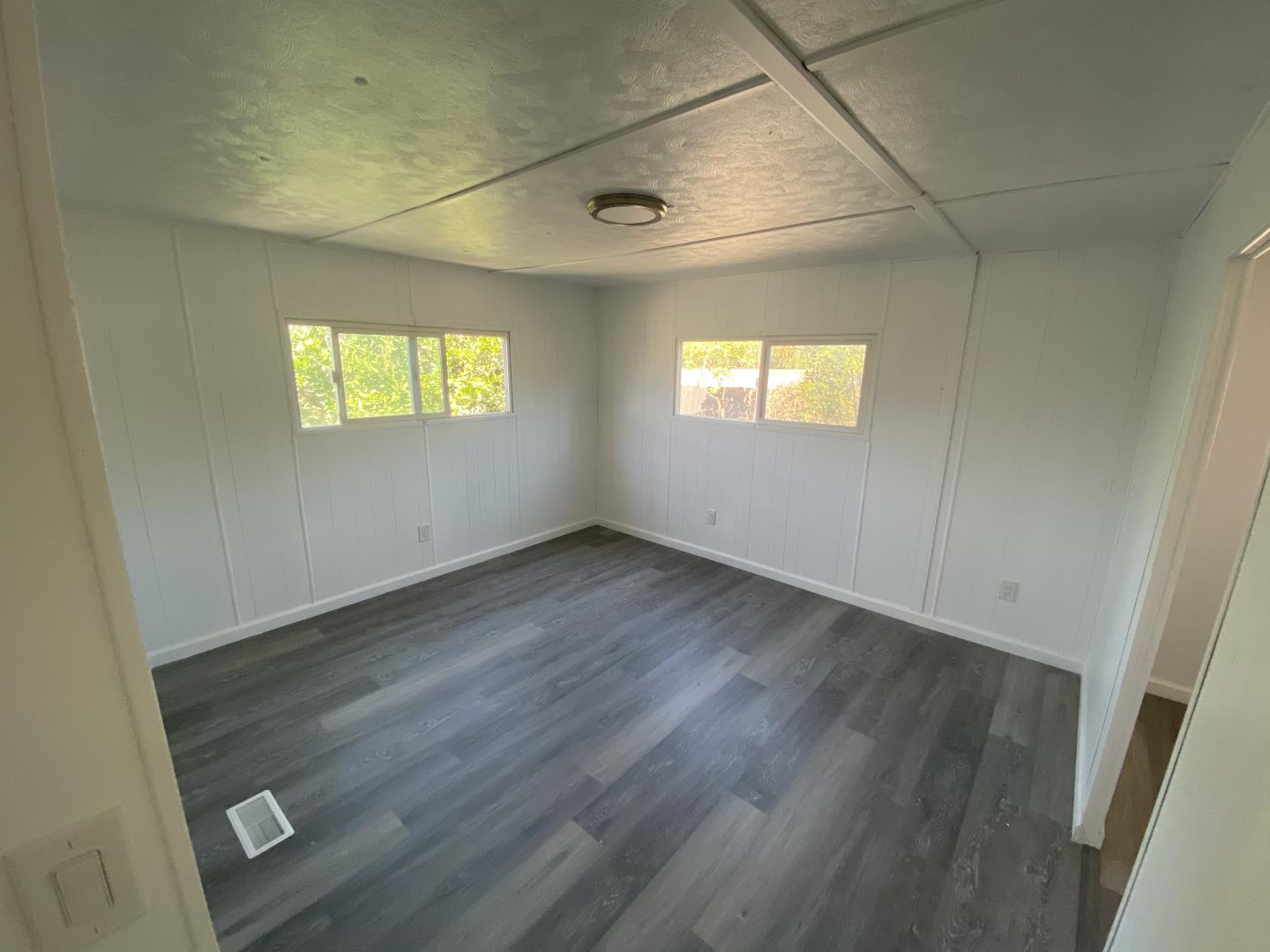 1220 Tasman Drive, Unit 87D Sunnyvale, CA 94089 - Photo 5 of 16 an empty room with windows