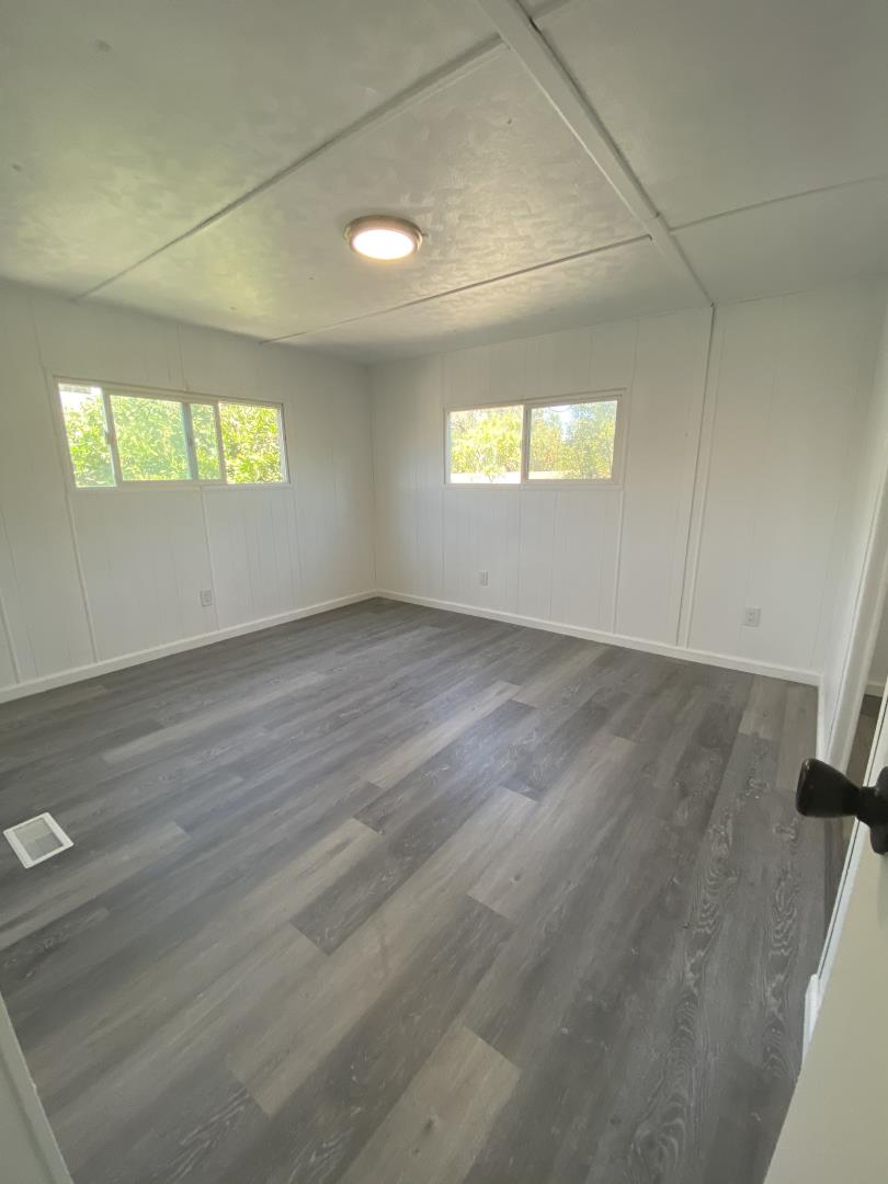 1220 Tasman Drive, Unit 87D Sunnyvale, CA 94089 - Photo 6 of 16 an empty room with windows