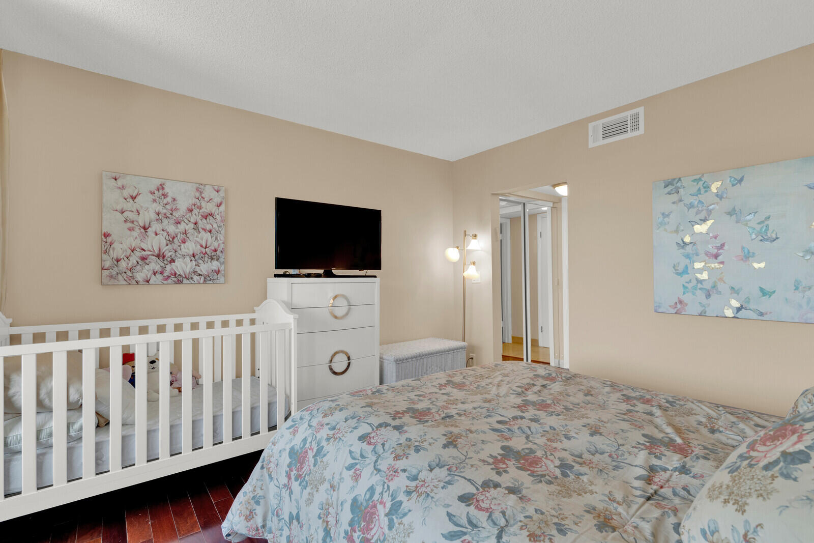 799 Jeffery Street, Unit 4070 Boca Raton, FL 33487 - Photo 14 of 41 a bedroom with a bed and a flat screen tv