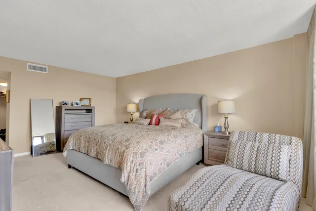 a sign that is in front of flowers